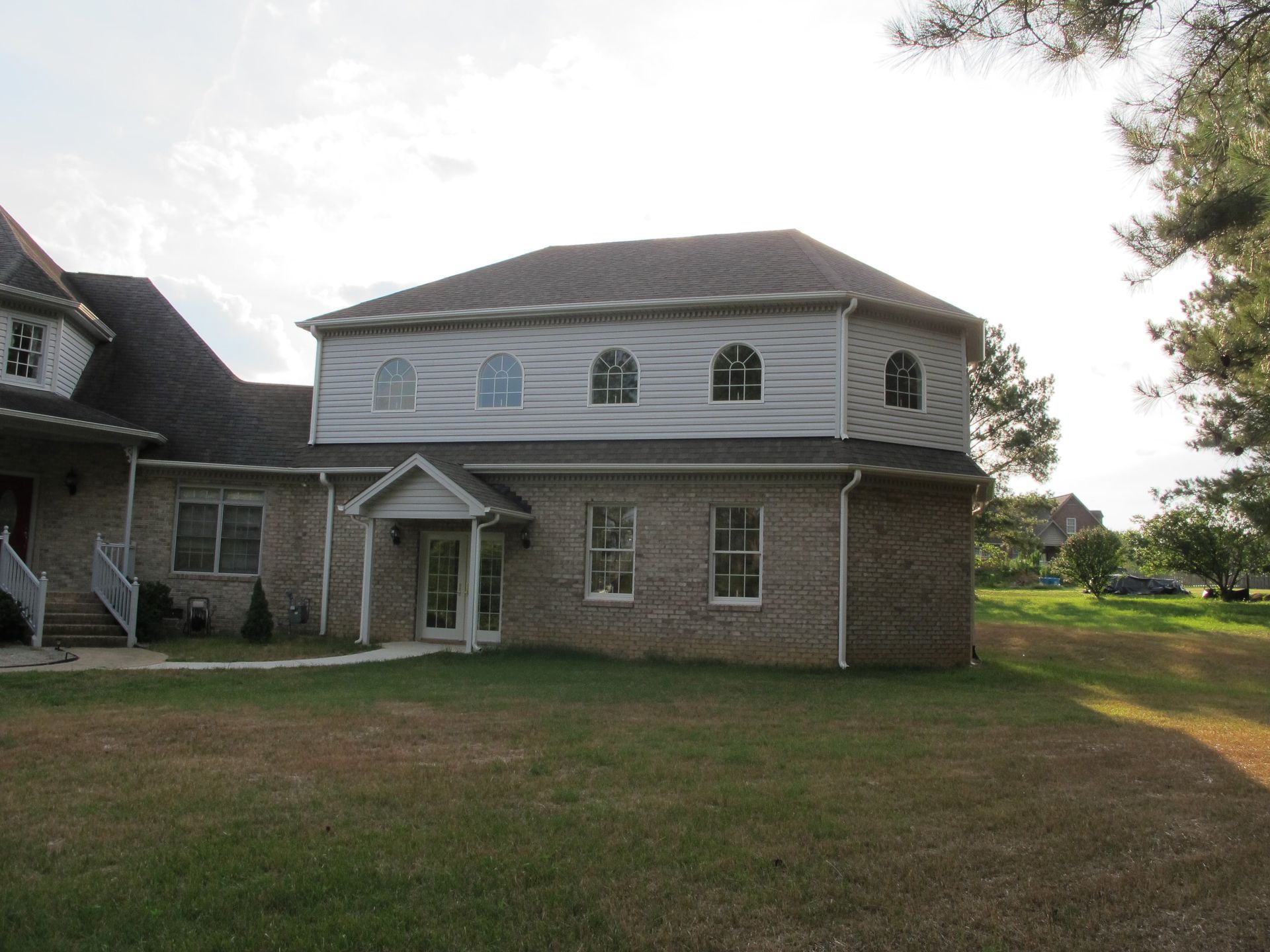 Chapel building constructed among pine trees